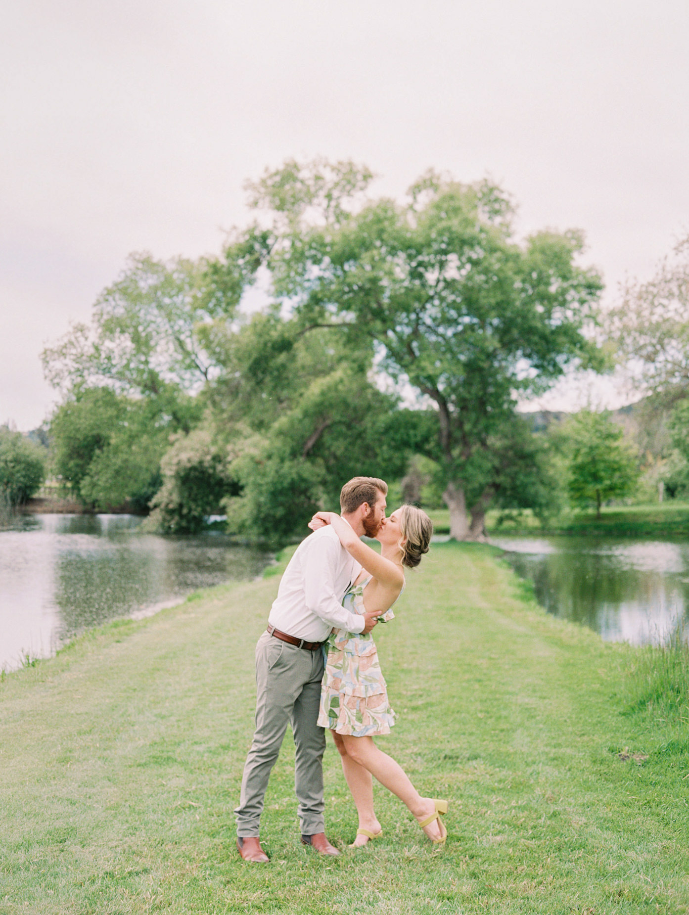 Couple kissing at Greengate Ranch Vineyard Engagement Photography