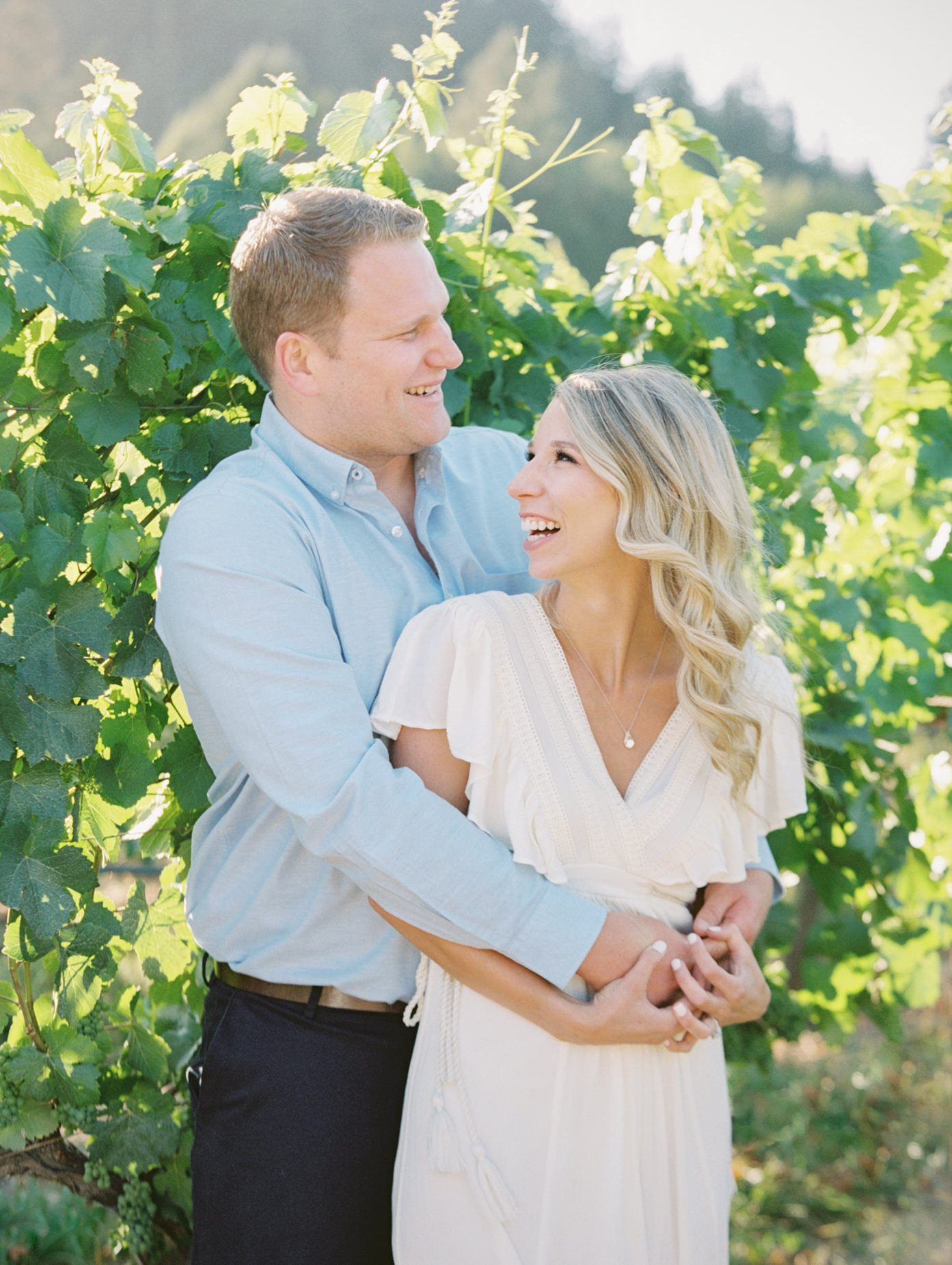 A fun engagement portrait during vineyard engagement at Williams Selyem Wines